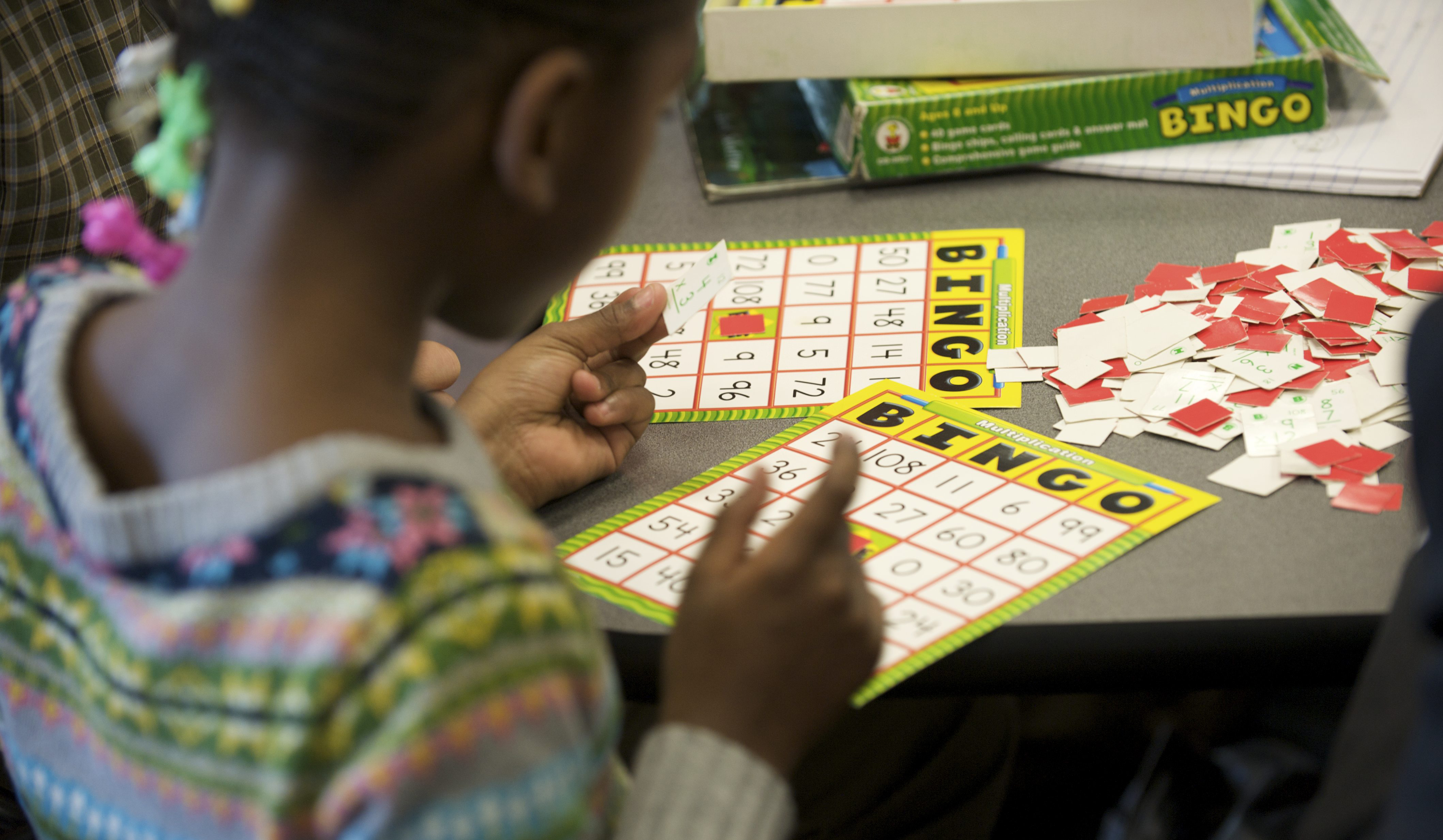 A young girl learning how to play 